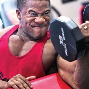 Man lifting weight in Gym